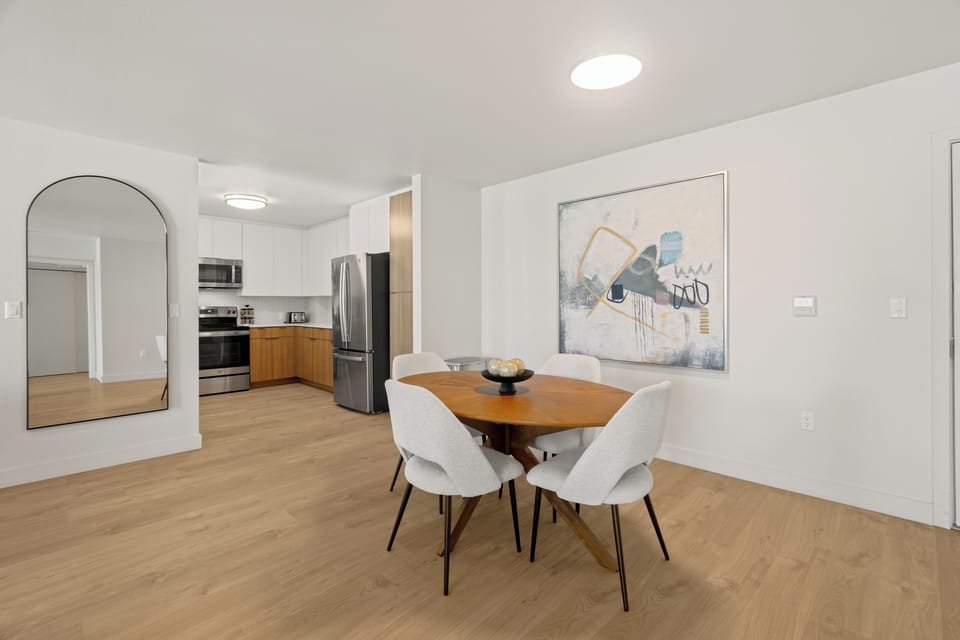 Enjoy meals together at this stylish, central dining table for four.