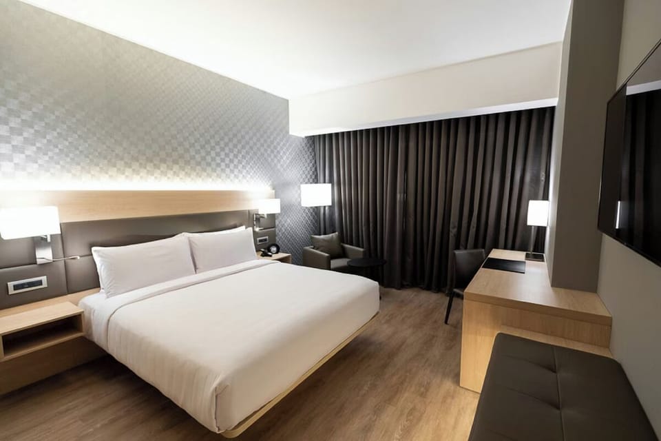 Stretch out in a modern room designed for deep rest.