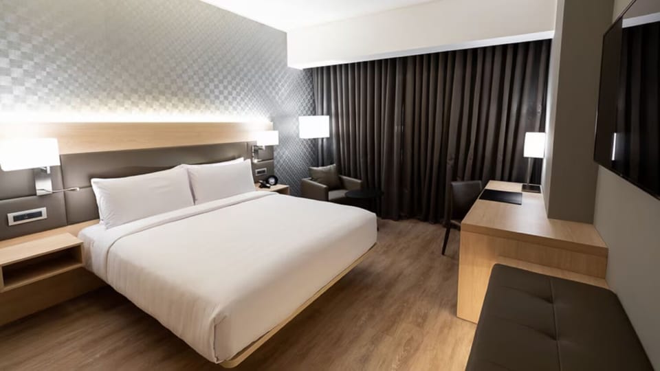 Settle in for a restful night with warm lighting.