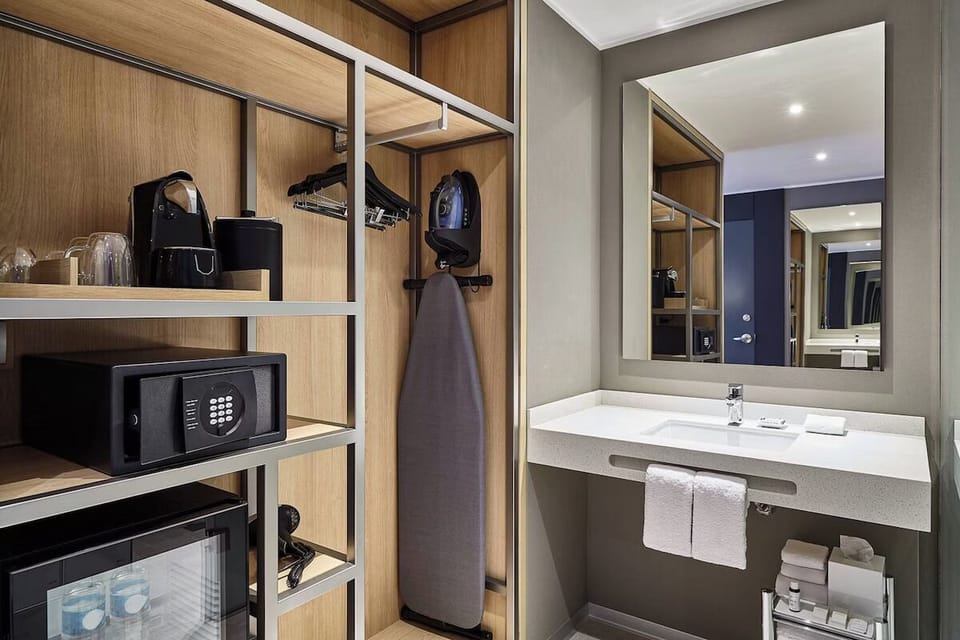 Freshen up easily with bright vanity space and tidy storage.