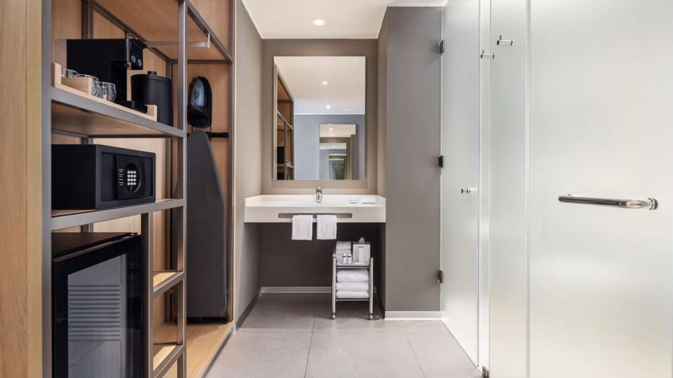 Enjoy a streamlined bathroom layout with generous counter space.