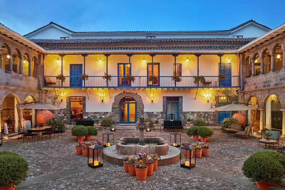 Arrive to a lantern-lit courtyard oasis with timeless charm.