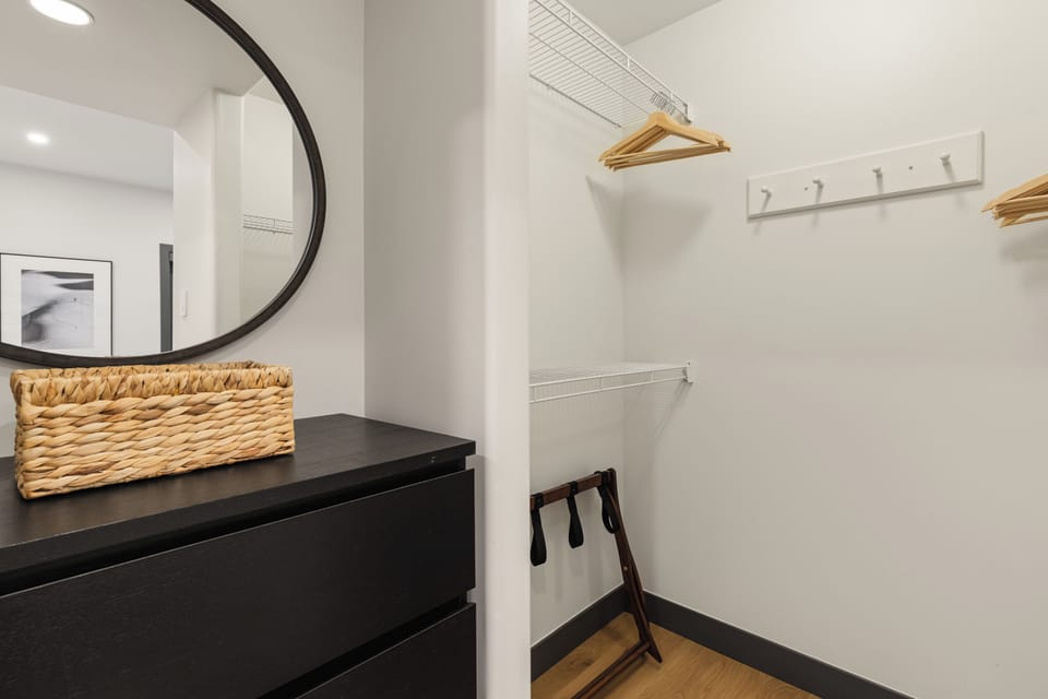 Bedroom 2 - Walk in closet and dresser. Offering ample storage for your stay.