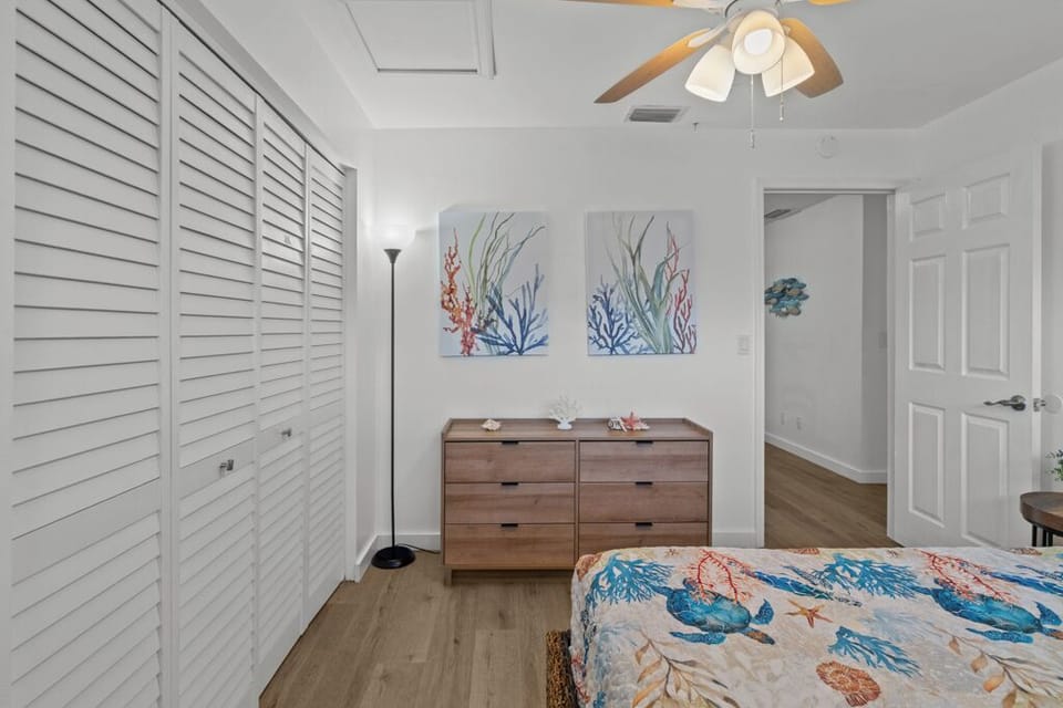 Guest bedroom with cozy decor and easy access to the main living area.