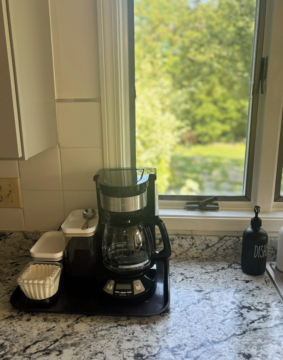Coffee maker and supplies