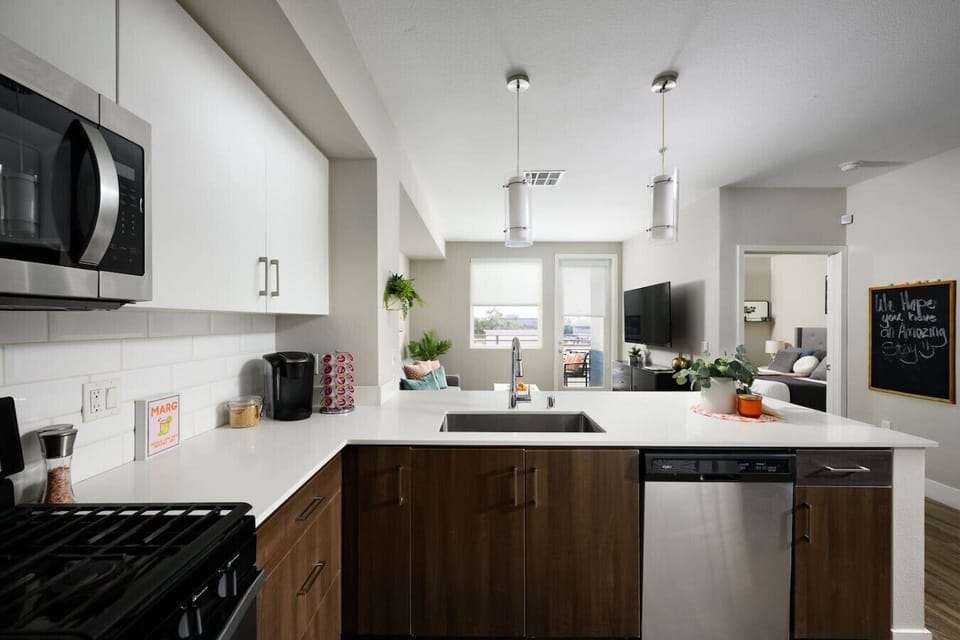 Modern kitchen stocked with cooking essentials and coffee for your mornings.