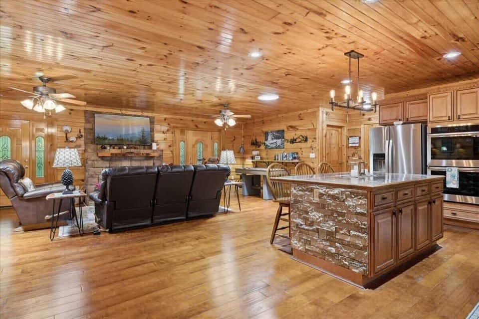 Enjoy evenings by the stone fireplace, surrounded by rustic charm and modern comforts!