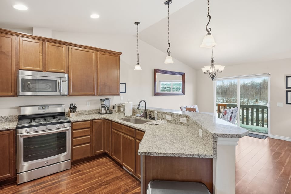 Stainless, gas stove, DW, microwave ... expansive counters and open floorplan