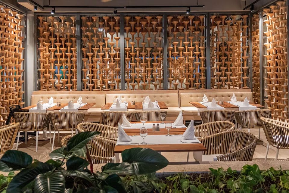 Gather for relaxed meals in chic, nature-inspired dining comfort.