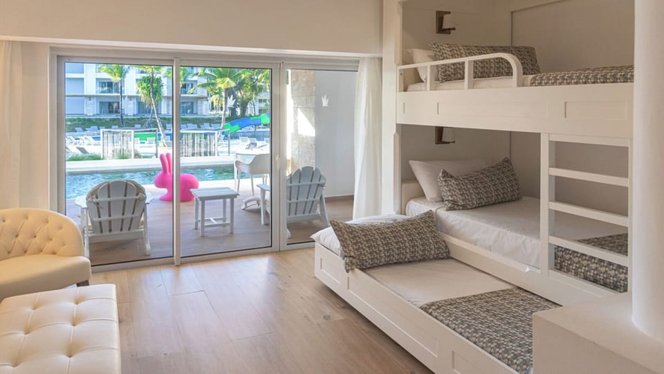 Step outside to patio seating with sparkling pool views.