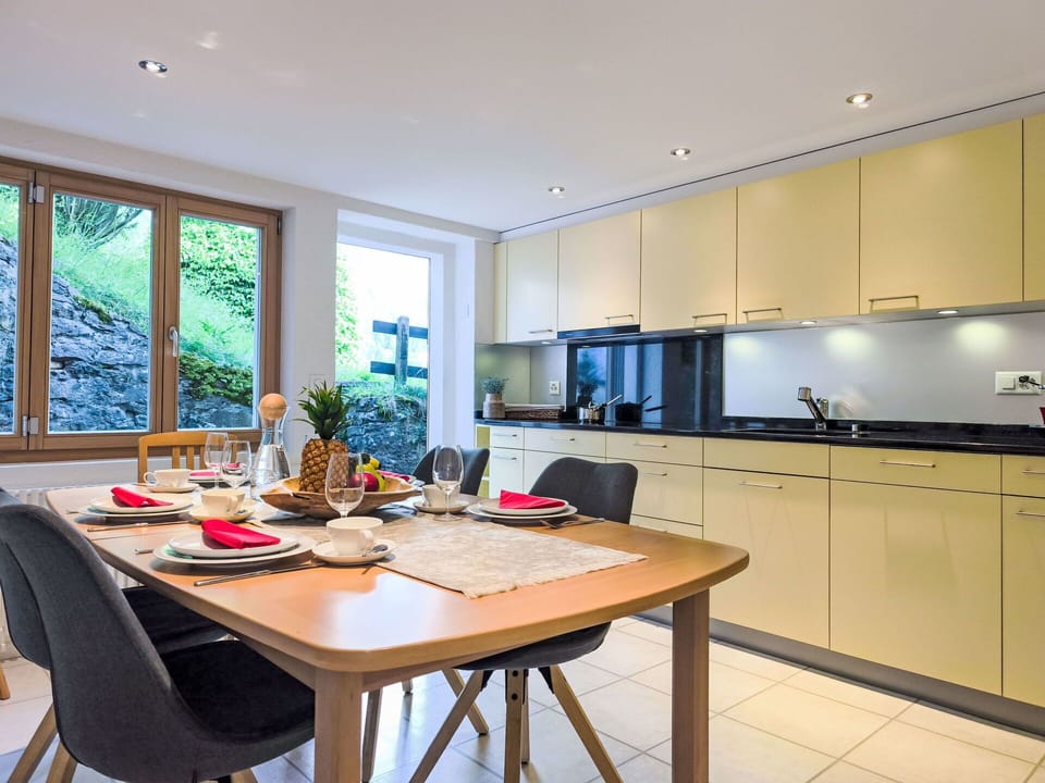 Interior Design, Furniture, Wood, Ceiling, Flooring, Lighting, Room, Kitchen Appliance, Kitchen, Countertop