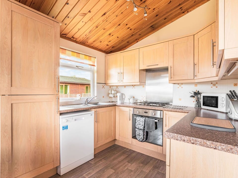 Wood, Kitchen, Interior Design, Major Appliance, Flooring, Countertop, Kitchen Appliance, Ceiling, Floor, Cabinetry