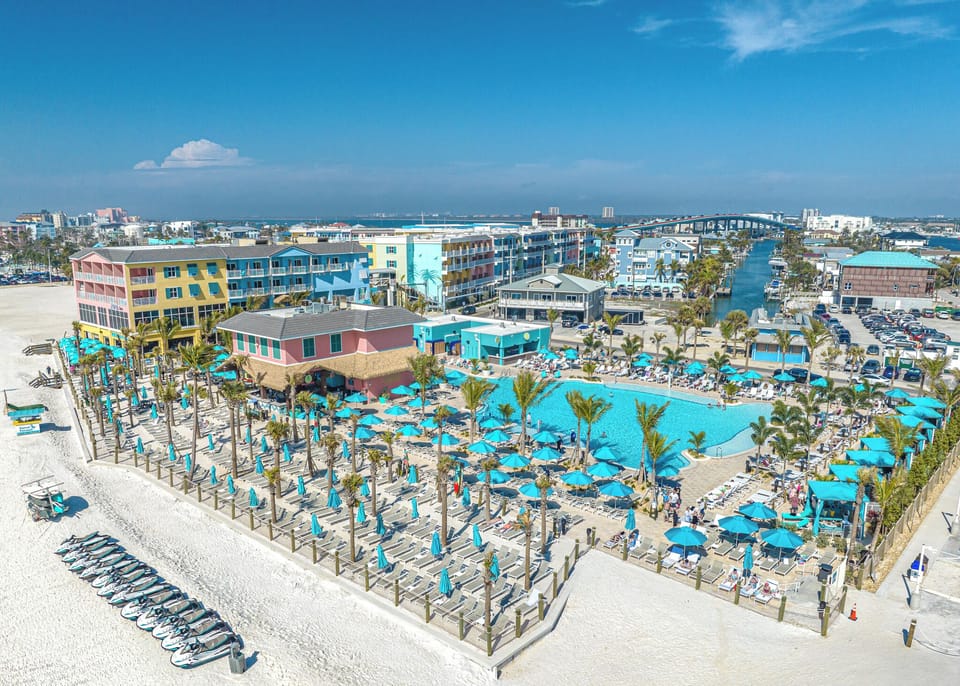 Soak up panoramic resort views with pool, beach, and marina.