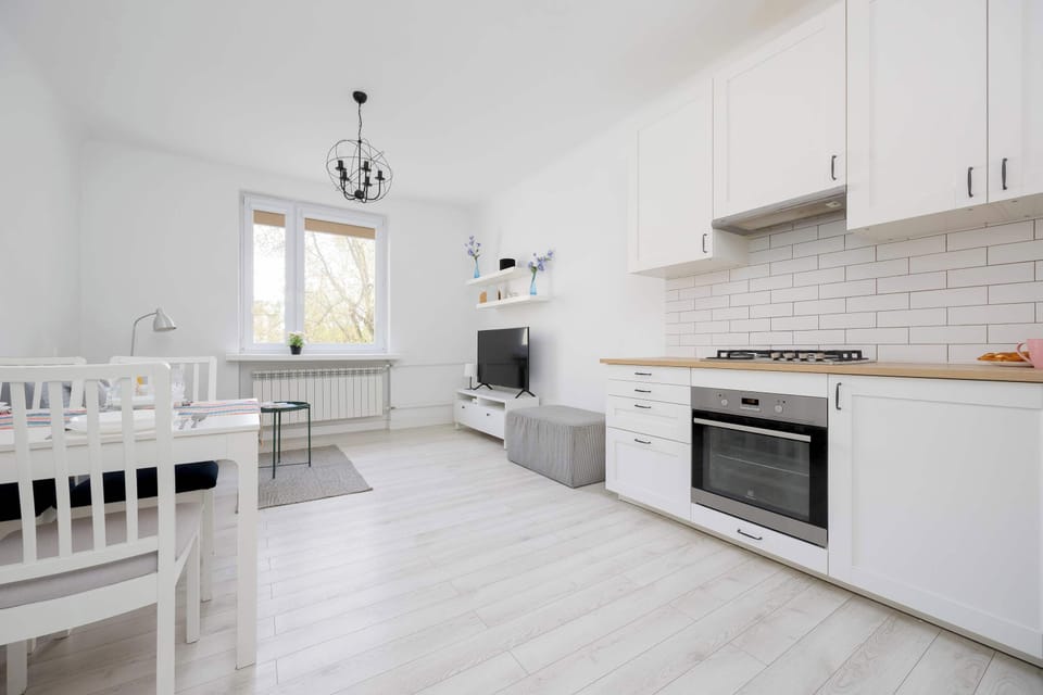 The functional layout connecting the kitchen, dining, and living area ensures comfort and openness.