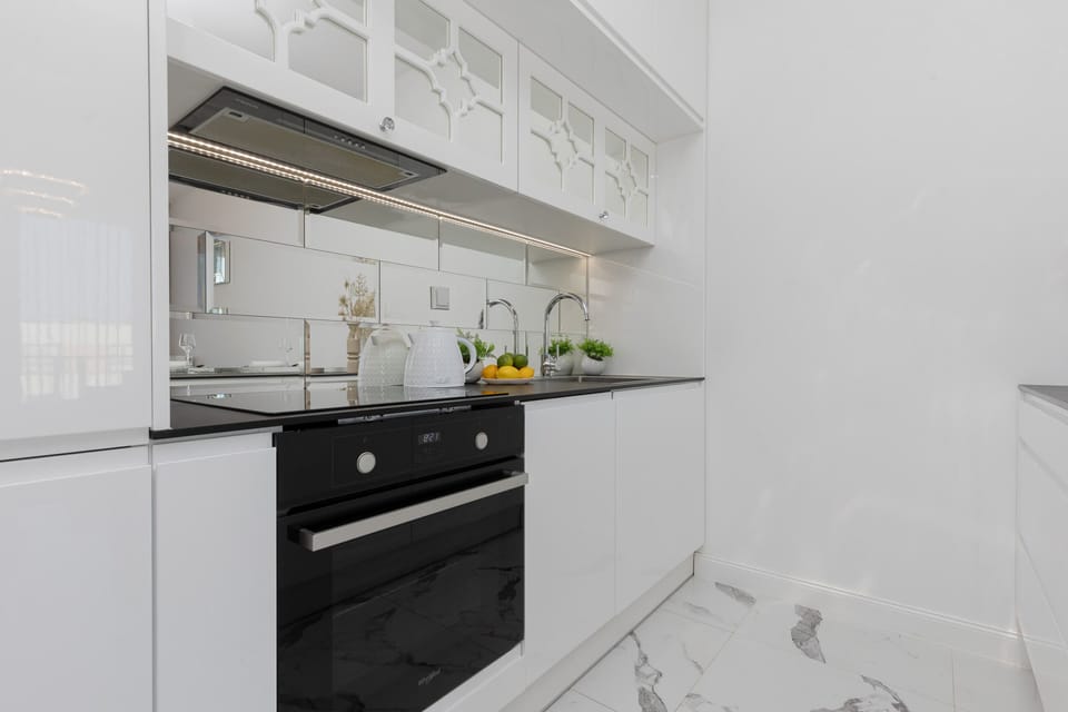 Kitchenette with a fridge.