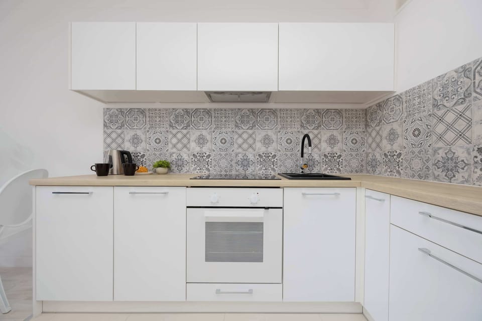 Modern appliances and bright countertops make home-style cooking a breeze.