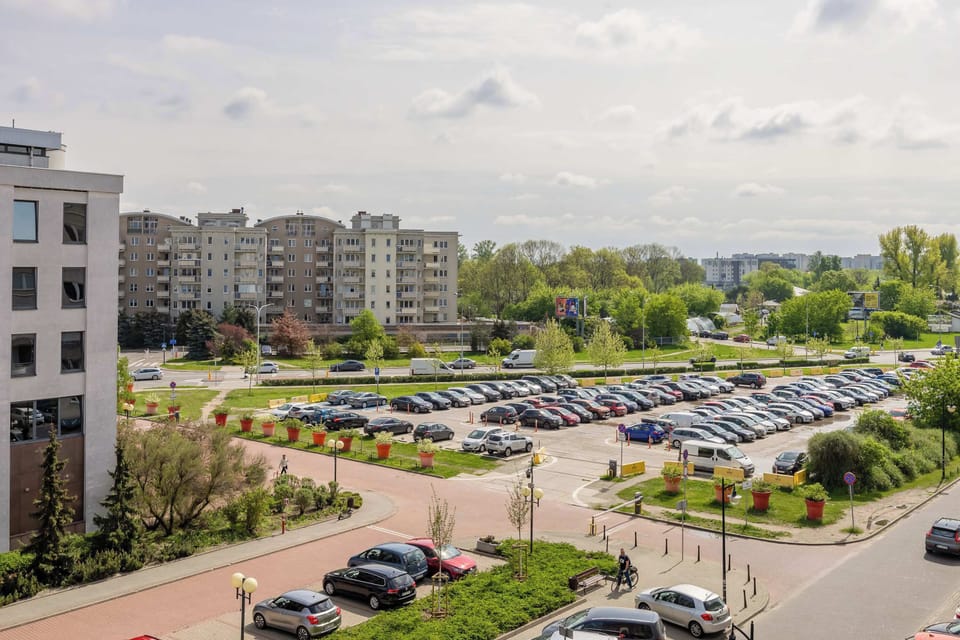 Aerial perspective of green inner courtyard – relaxing environment with greenery.