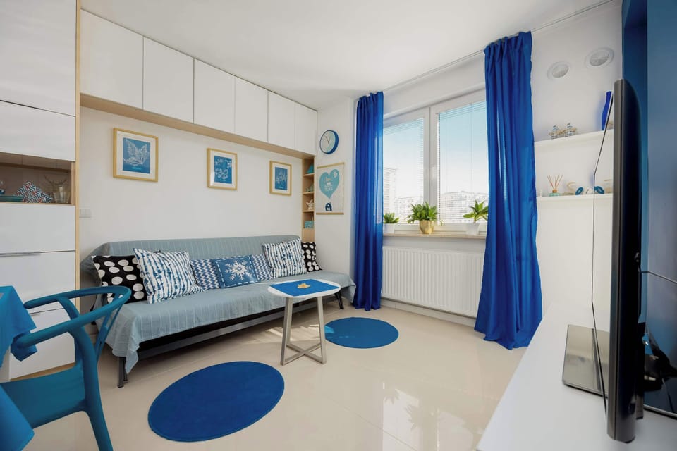A comfortable sofa bed for two in a cosy living room. 