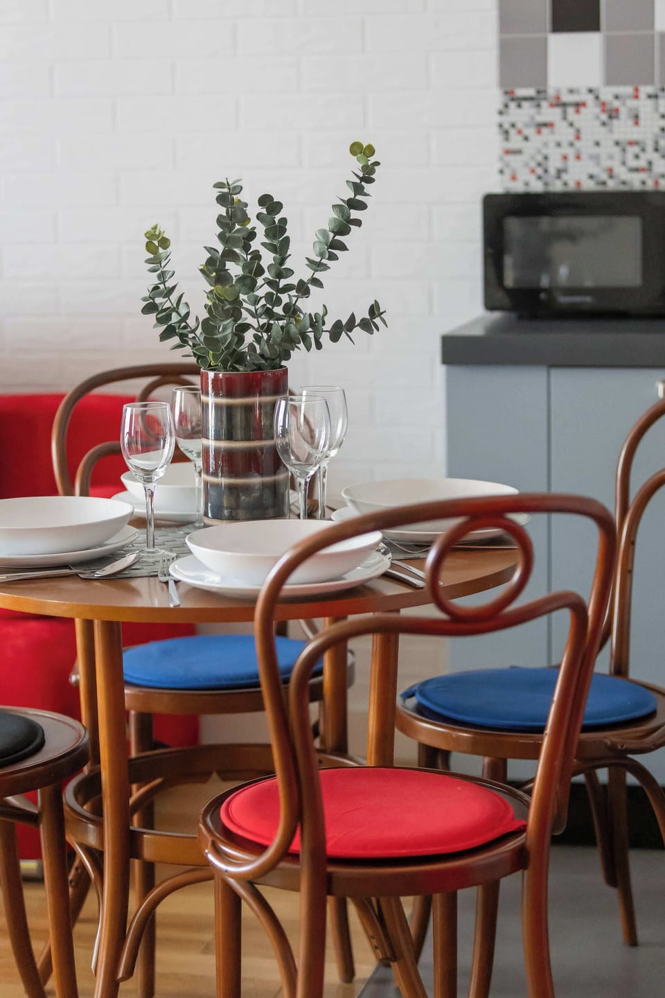 Dining table with tableware.