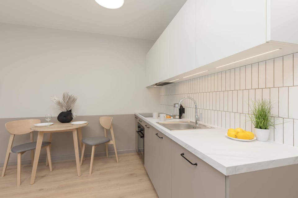 Compact kitchenette with functional dining table