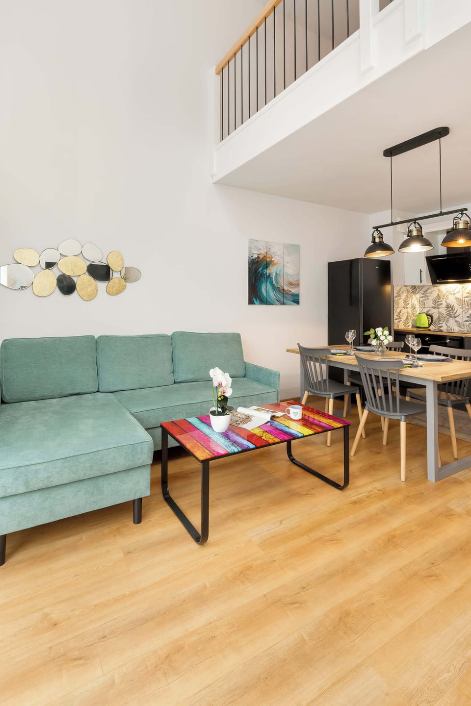 Living room and modern kitchenette.