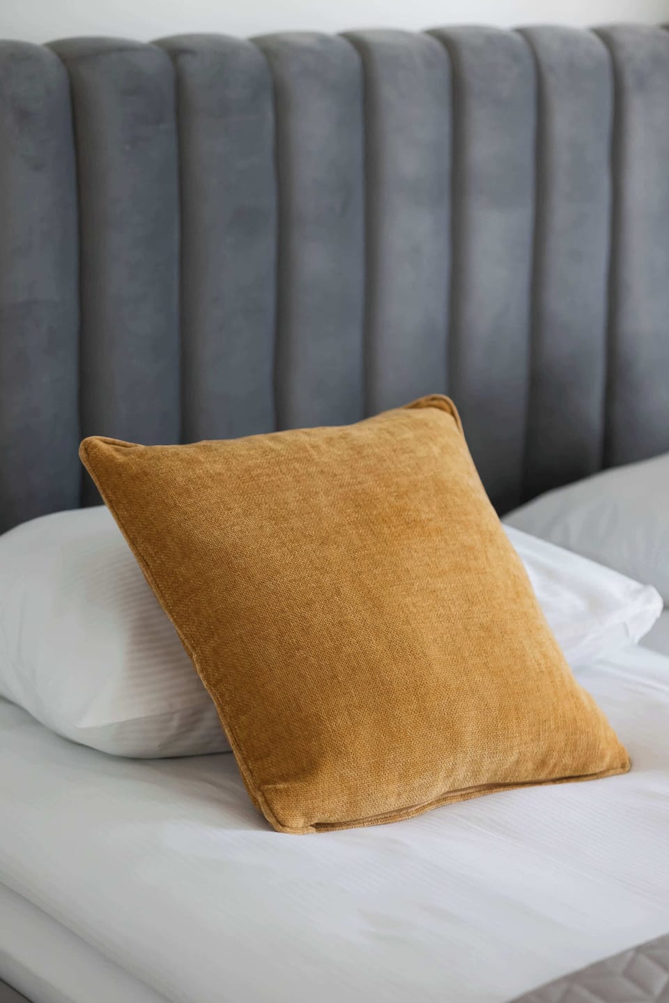 Soft pillows on the bed.