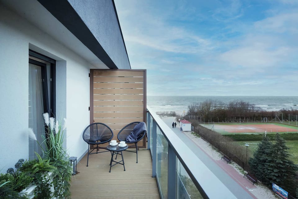 Furnished balcony with sea view.