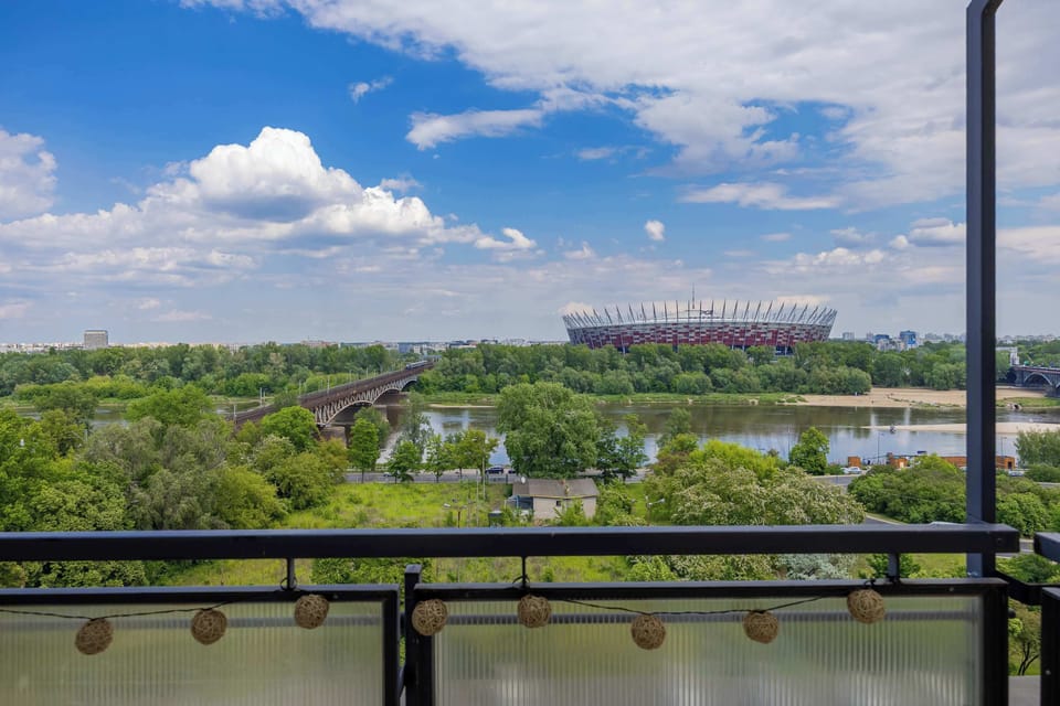 View from the balcony overlooking the river and the national stadium.