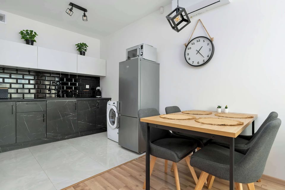 The kitchenette's practical layout maximizes space and functionality.