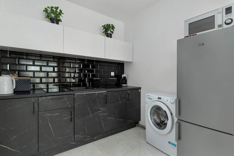 The fully equipped kitchenette includes everything you need for a home-cooked meal.