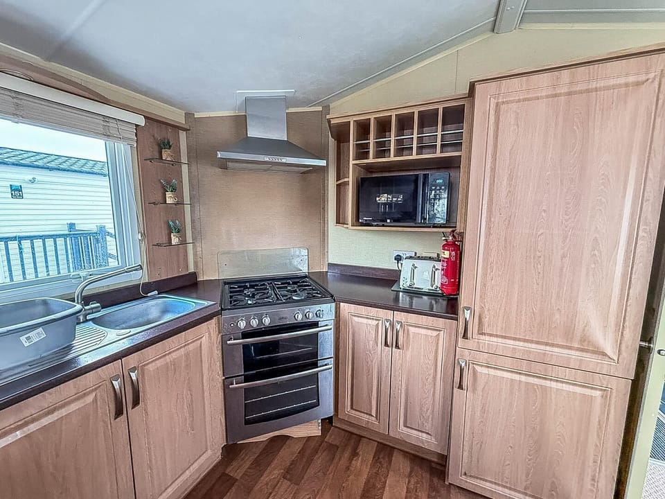 Cozy kitchen with modern appliances and ample storage