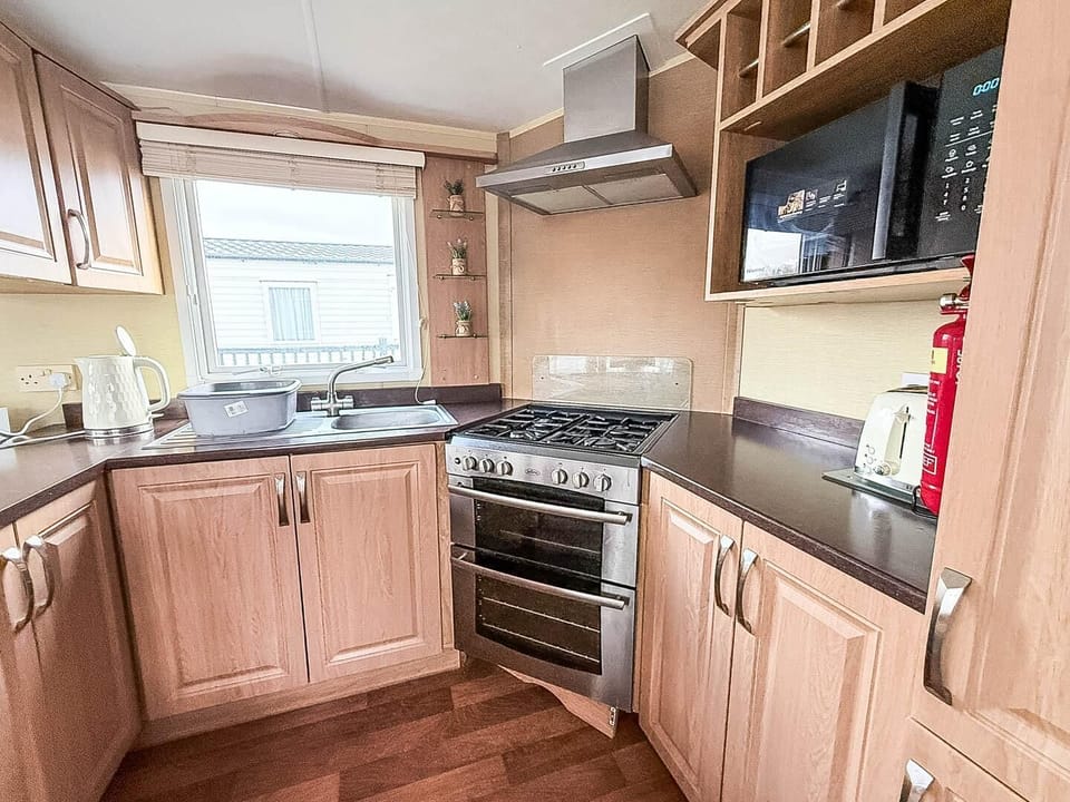 Cozy kitchen with modern appliances and ample storage