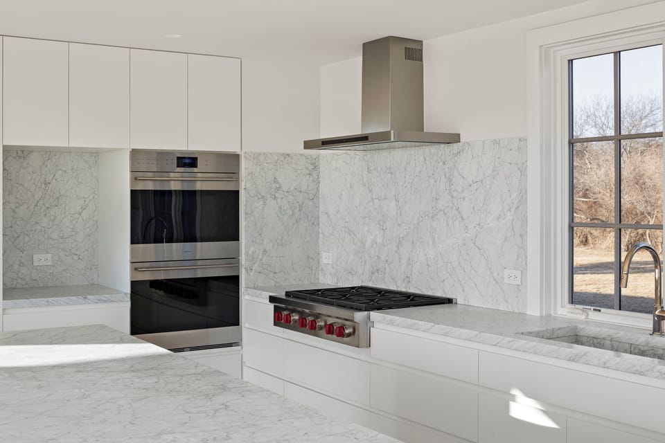 Kitchen with Italian Carrera marble