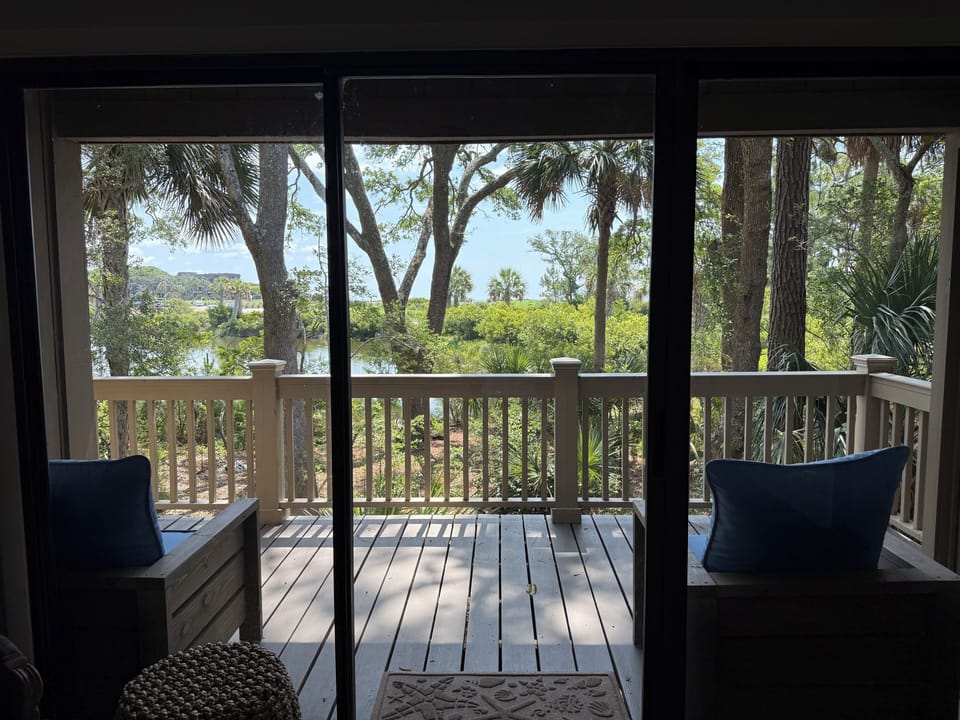 View the enchanting lagoon from comfortable deck chairs on wrap-around deck!