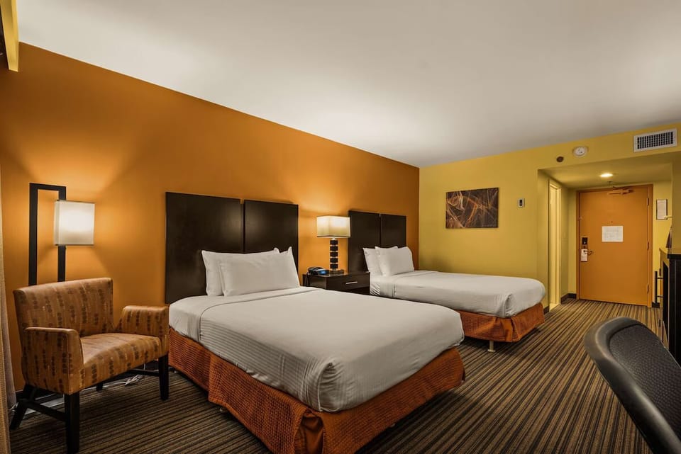 Unwind in the cozy chair with soft evening lighting.
