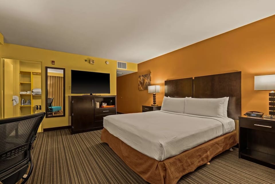 Settle in with spacious comfort, TV entertainment, and easy room flow.