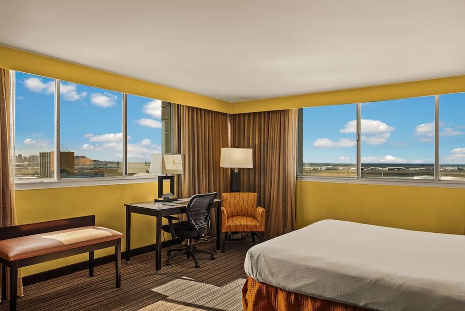 Sip coffee by panoramic windows and work comfortably at the desk.