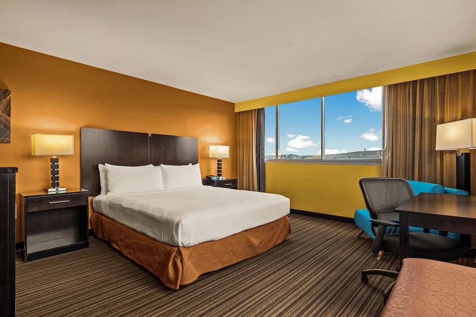 Wake up to sunshine and stretch out in bright, airy comfort.