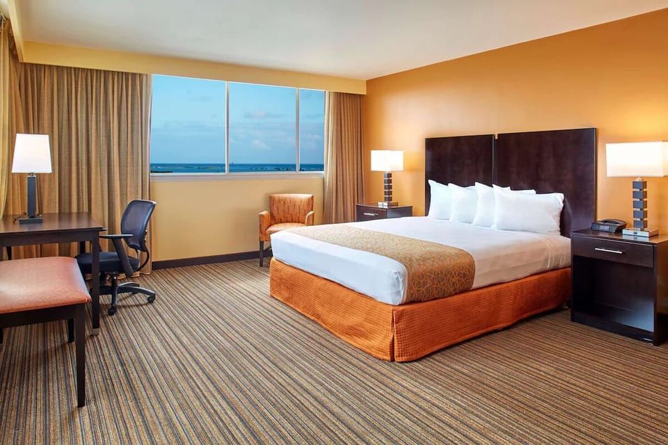 Wake to sweeping water views from your serene, spacious retreat.