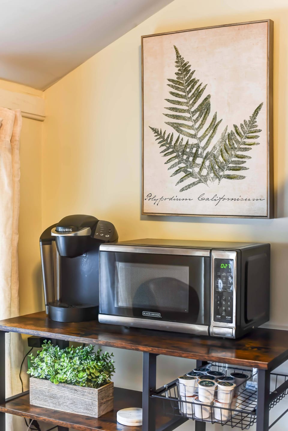 Wake up inspired, pop in a coffee pod and enjoy your cup beneath calming leaf art that brings a touch of nature indoors.