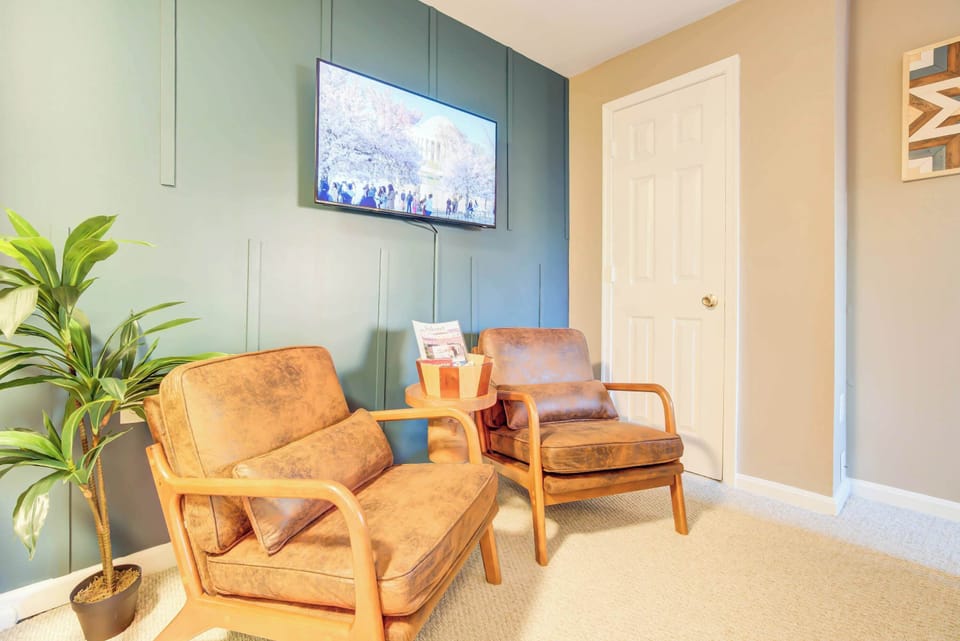 Unwind in your Southwest-inspired lounge, where warm tones and plush seating make your stay feel like home. After exploring Alexandria’s waterfront and historic charm, kick back, relax, and enjoy your perfect NOVA retreat!