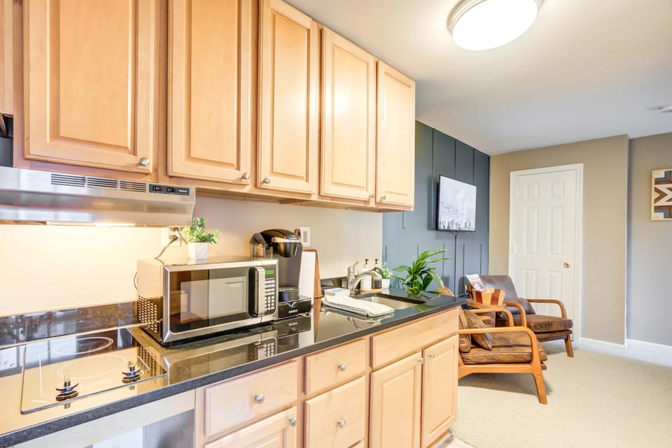 Enjoy your morning coffee, cook a quick meal, or unwind in your cozy lounge. With a fully equipped kitchenette and a warm, inviting design, this space is perfect for your stay—whether you’re here for work, fun, or a little of both!