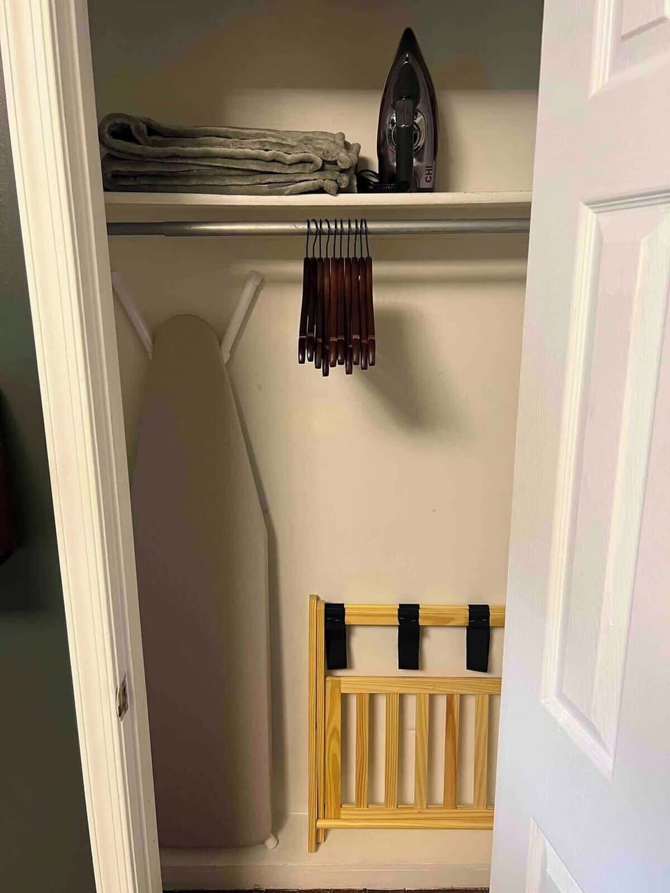 A luggage rack, iron, and full-size ironing board are conveniently located in the closet to your right as you walk in the door, everything you need to stay organized and comfortable during your stay.