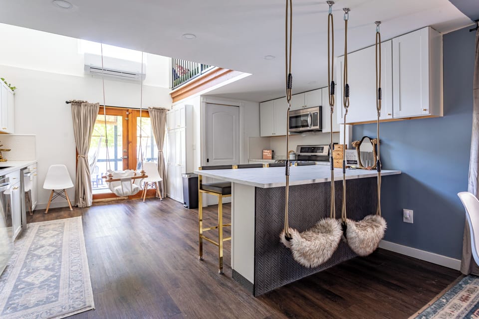 Luxury kitchen with whimsical swings and a baby swing for your tot. 