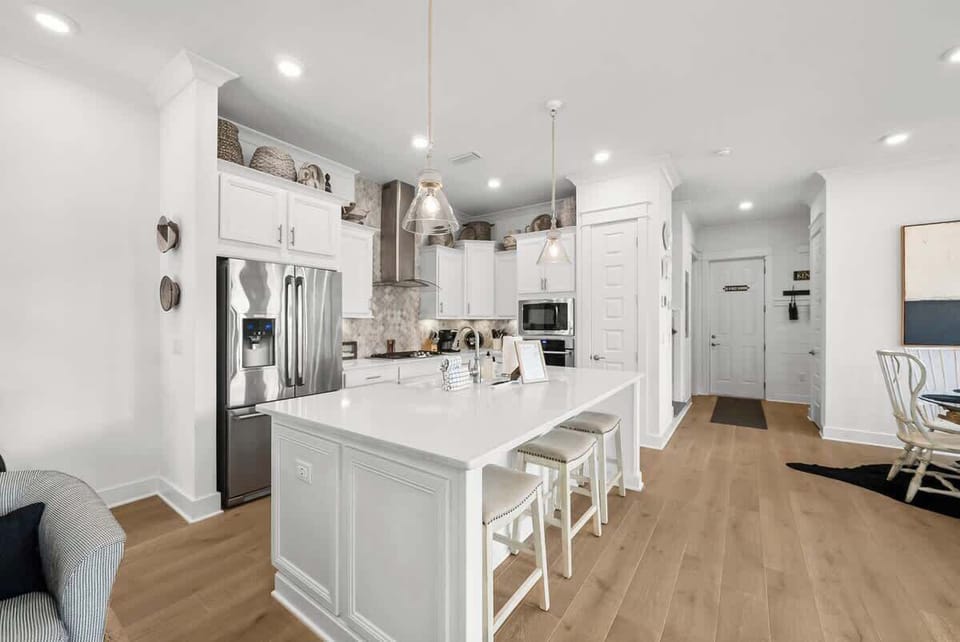 Large kitchen island includes seating for 3.