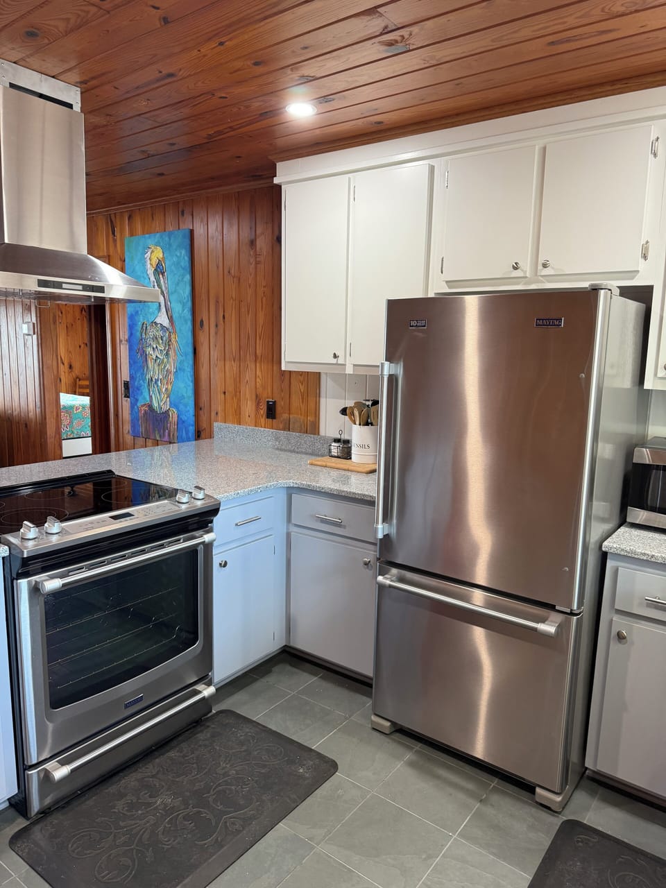 plenty of pots, pans, clean appliances,  crockpot, blender, hand mixer, toaster