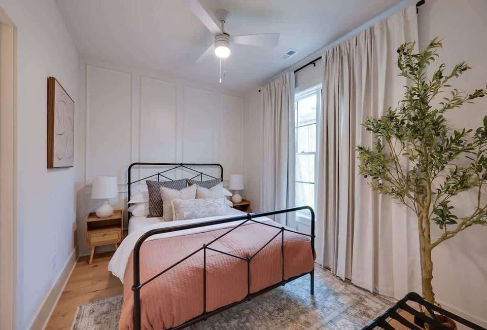 1st Floor: 4th Bedroom featuring a Queen bed and en-suite bathroom.