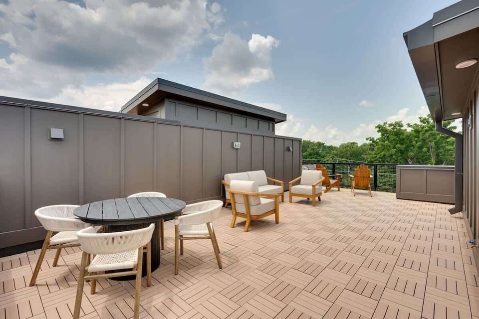 Rooftop Patio featuring an outdoor lounge area and an outdoor dining area with seating for 4 guests.