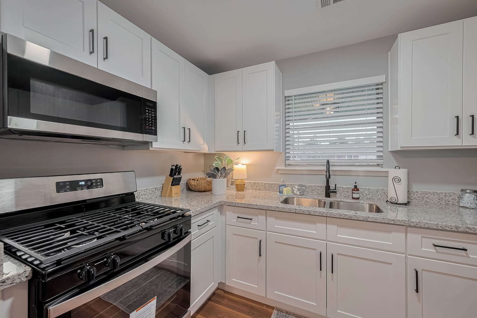 Modern Kitchen: Cook up a storm in this bright kitchen with stylish appliances and sleek finishes.