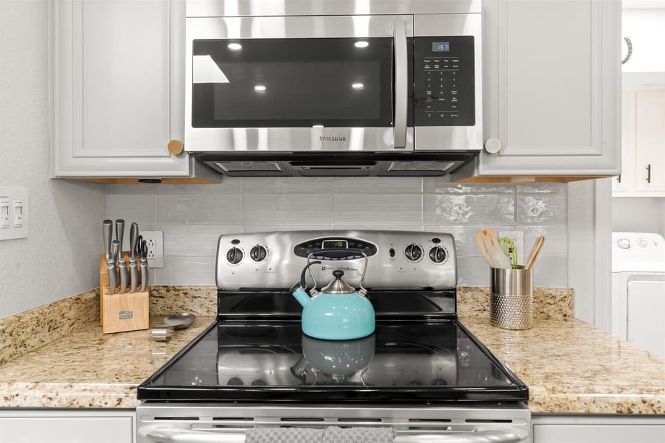 Cook like a pro in our kitchen featuring high-end appliances, ample counter space, and all the essentials you need to whip up anything from a quick breakfast to a gourmet dinner.